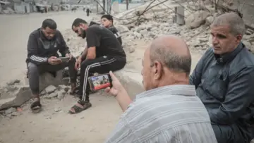 AA-20261027-42884288-42884266-PALESTINIANS_IN_GAZA_FOLLOW_ISRAELI_GENERAL_ELECTIONS-1793178219 (1)